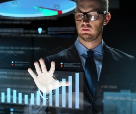 Businessman with virtual charts Stock Photo 07