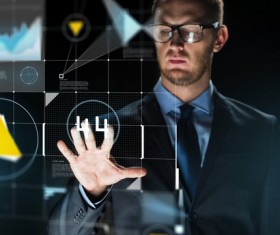 Businessman with virtual charts Stock Photo 08