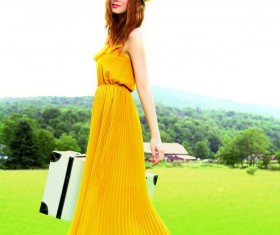 Carrying a suitcase to travel Stock Photo