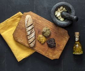 Coarse bread and food oil Stock Photo