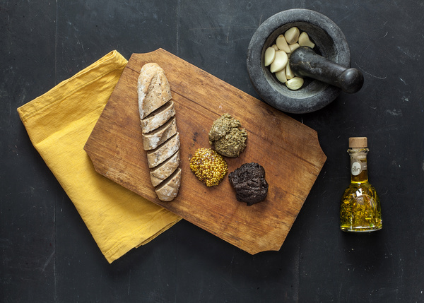 Coarse bread and food oil Stock Photo