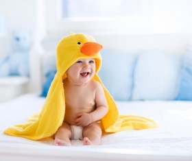 Dressed in small yellow duck coat baby HD picture