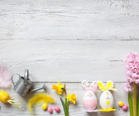 Easter wooden background with eggs, candy and flowers Stock Photo 01