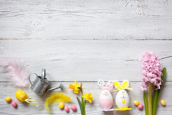 Easter wooden background with eggs, candy and flowers Stock Photo 01