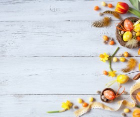 Easter wooden background with eggs, candy and flowers Stock Photo 02