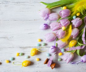 Easter wooden background with eggs, candy and flowers Stock Photo 03