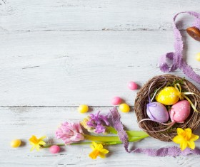 Easter wooden background with eggs, candy and flowers Stock Photo 08