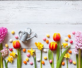 Easter wooden background with eggs, candy and flowers Stock Photo 10