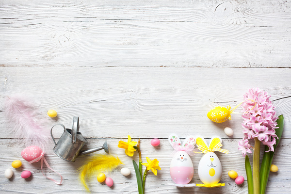 Easter wooden background with eggs, candy and flowers Stock Photo 11