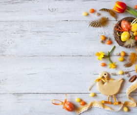 Easter wooden background with eggs, candy and flowers Stock Photo 13