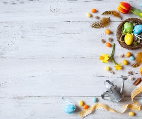 Easter wooden background with eggs, candy and flowers Stock Photo 15