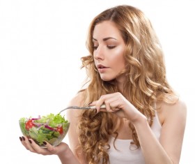 Eat vegetable salad with a fork woman HD picture