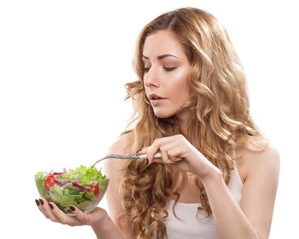Eat vegetable salad with a fork woman HD picture