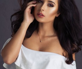 Elegant woman wearing a white dress Stock Photo