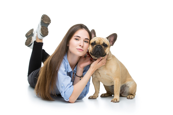French bulldog and woman taking pictures Stock Photo