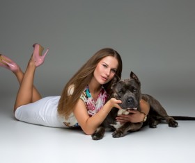 Girl and dog Gray Stafford Stock Photo
