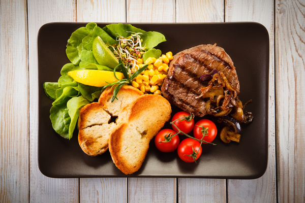 Grilled steak with toasted buns on wooden background HD picture