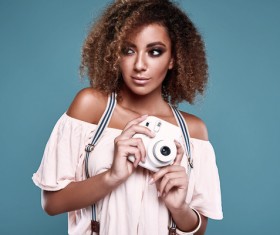 Hand holding the camera curly girl HD picture