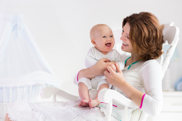 Happy baby with smiling mom Stock Photo free download