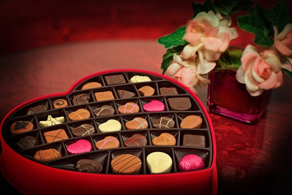 Heart-shaped gift box of chocolate Stock Photo