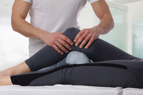Joint massage therapy Stock Photo