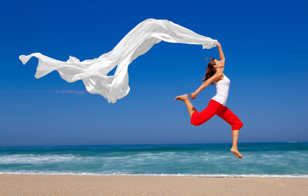 Jumping woman waving white satin HD picture