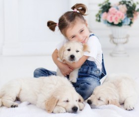 Little girl with pet dog Stock Photo