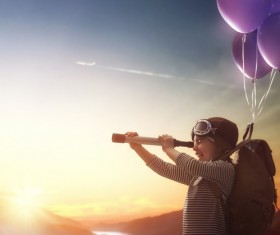 Look at distant children with binoculars HD picture