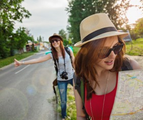 Look at the map of the girl with the free ride of the girl Stock Photo