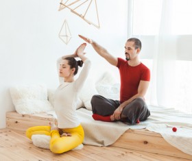 Men and women practicing yoga at home Stock Photo 04