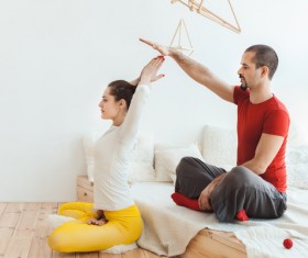 Men and women practicing yoga at home Stock Photo 05