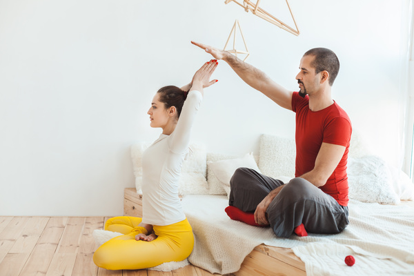 Men and women practicing yoga at home Stock Photo 05