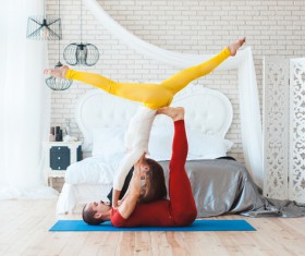 Men and women practicing yoga at home Stock Photo 10