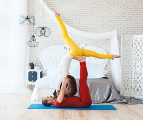 Men and women practicing yoga at home Stock Photo 11