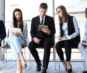 Men and women waiting for interview HD picture