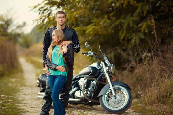 Motorcycle before the woman with the man Stock Photo