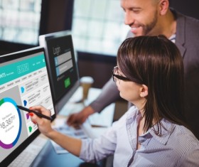 Office colleagues to view business icons Stock Photo