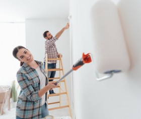 Paint the walls white couples Stock Photo