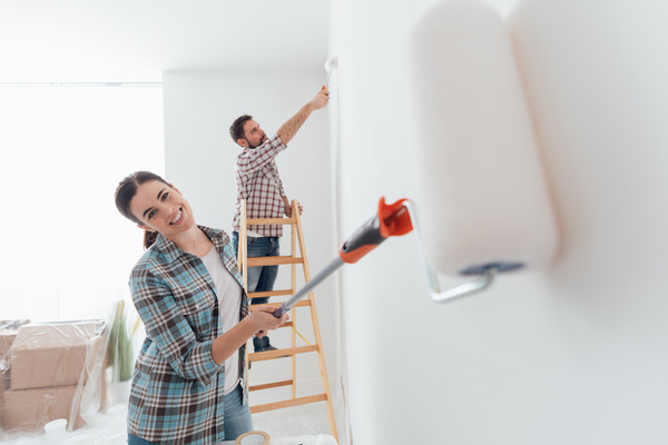 Paint the walls white couples Stock Photo