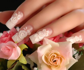 Pink rose carved nail Stock Photo