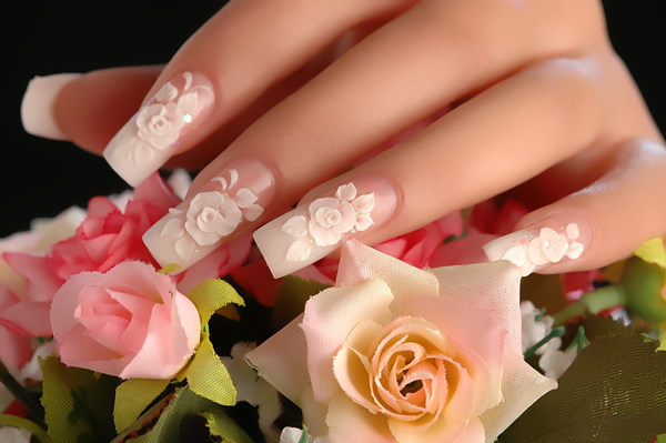 Pink rose carved nail Stock Photo