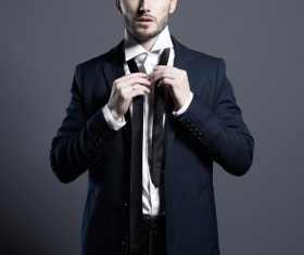 Playing black tie handsome man Stock Photo 01