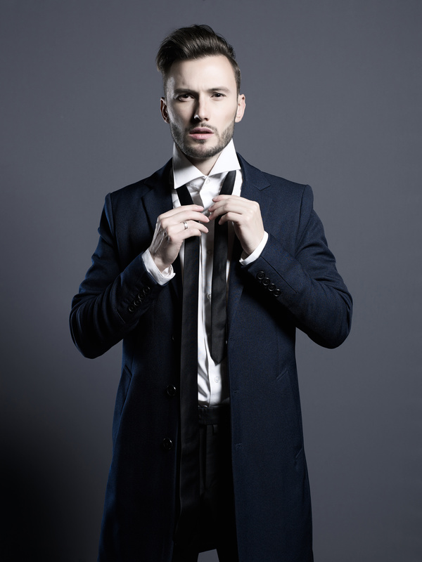 Playing black tie handsome man Stock Photo 01