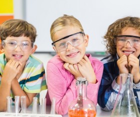 Pupils do chemistry experiments Stock Photo 02
