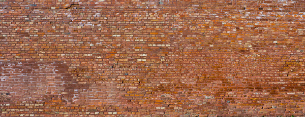 Red dotted brick wall texture Stock Photo