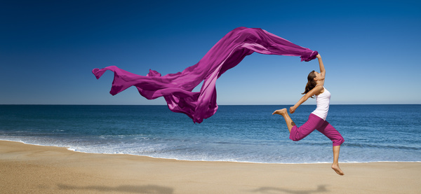 Seaside dancing woman with purple satin HD picture