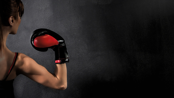 Show biceps female boxer Stock Photo