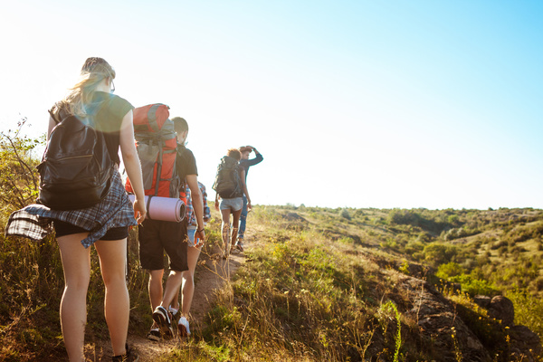 Sightseeing tour of backpackers Stock Photo