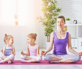Sit cross-legged beauty and children Stock Photo