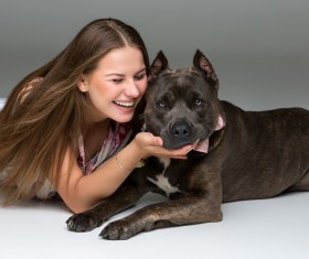 Smiling Girl with Gray Stafford Dog Stock Photo